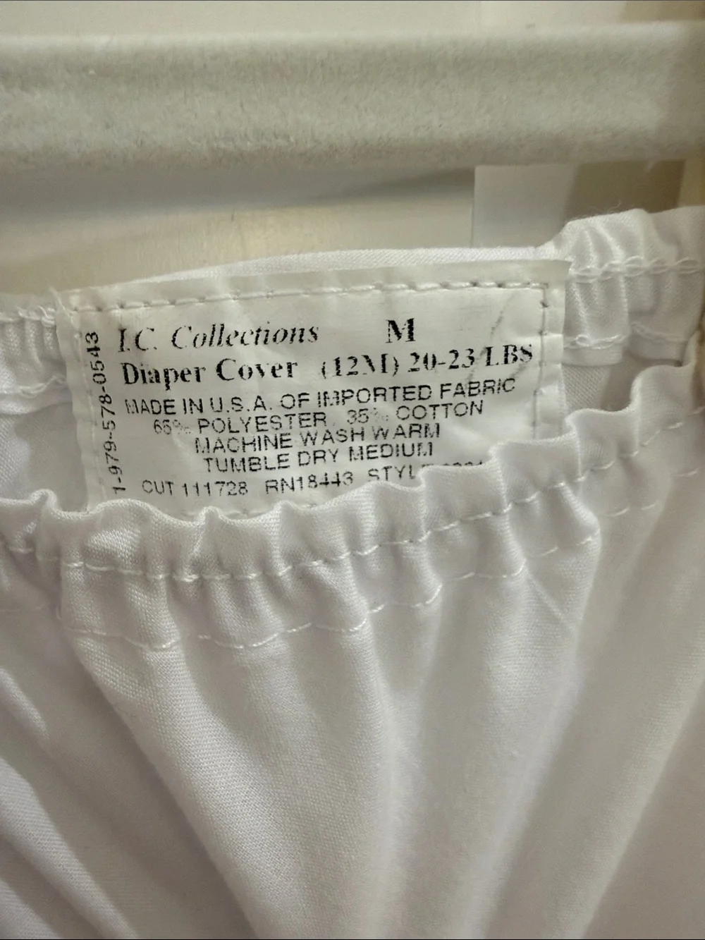 Pair of IC COLLECTIONS White Ruffle Diaper Covers w/ “C” Floral Monograms